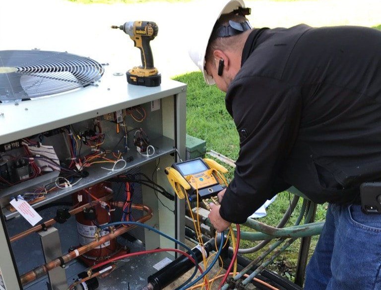 nick dolinic hvac technician working